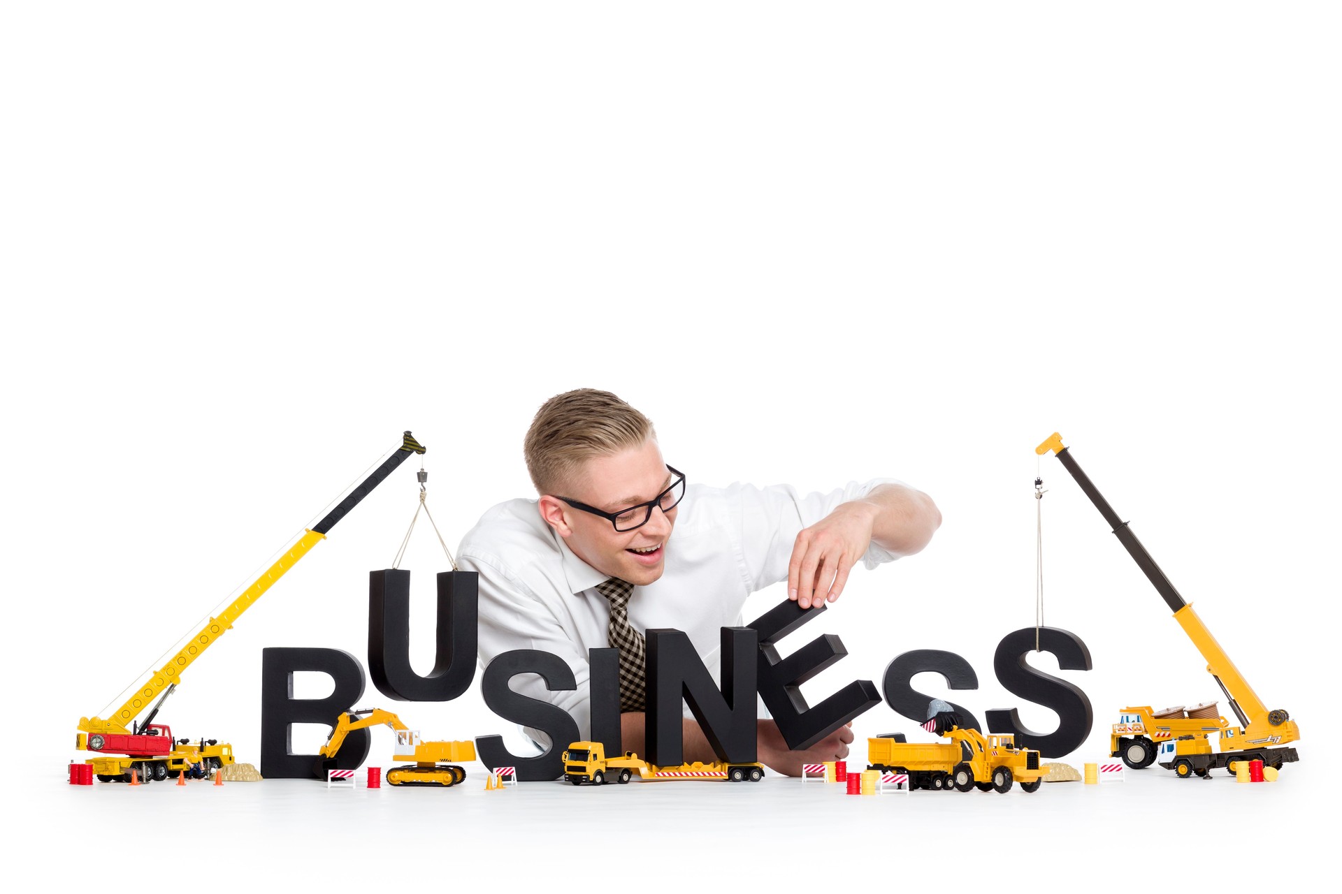 Business start up: Businessman building business-word.